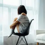 Individual Therapy Nashville | Woman Sitting Alone