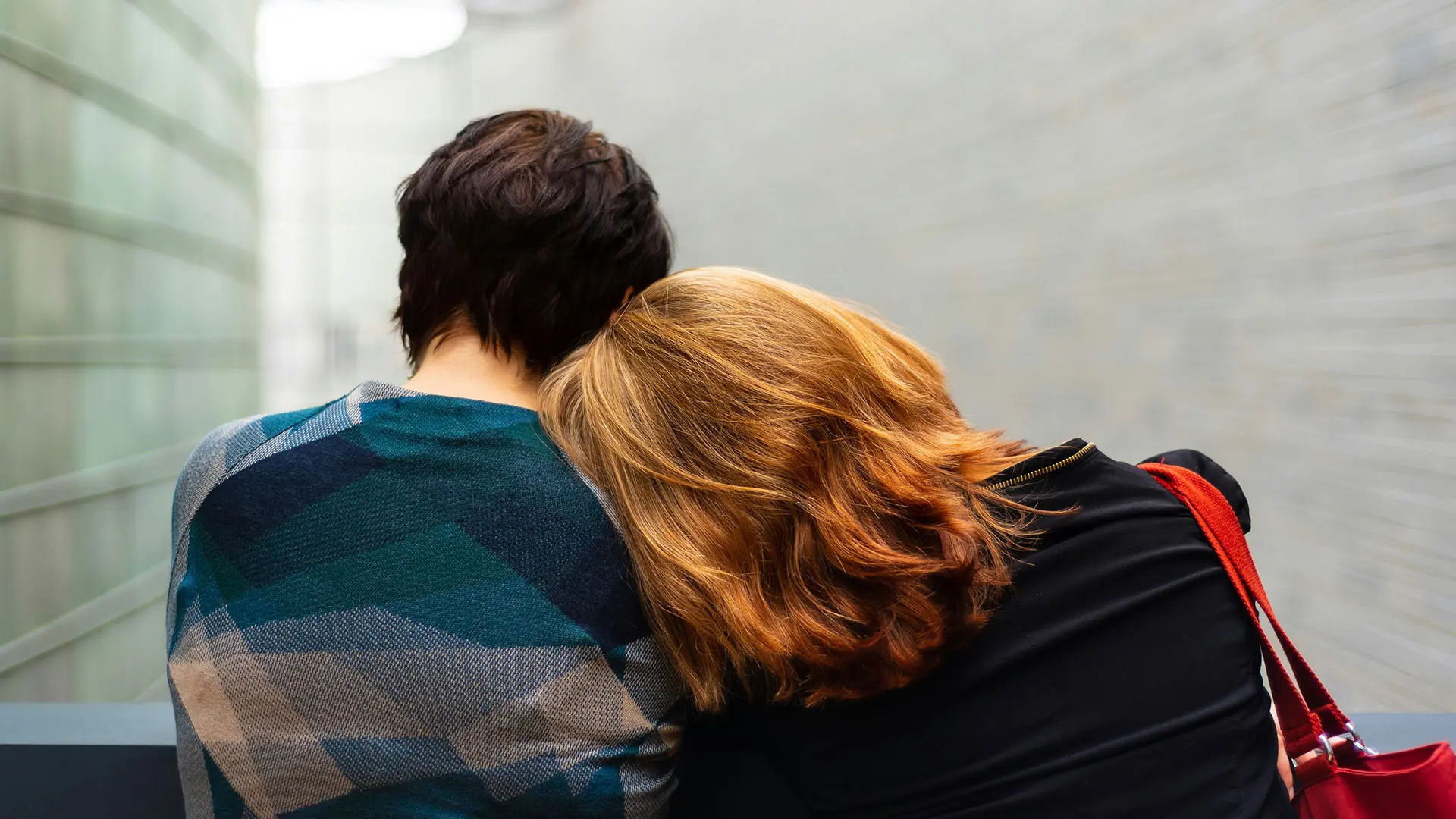 woman resting her head on man