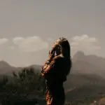 Addiction Recovery Nashville | woman on mountain