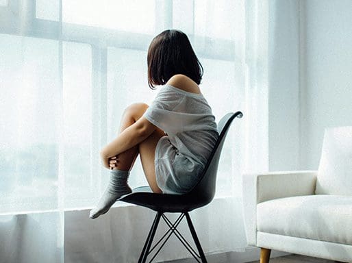 Individual Therapy Nashville | Woman Sitting Alone
